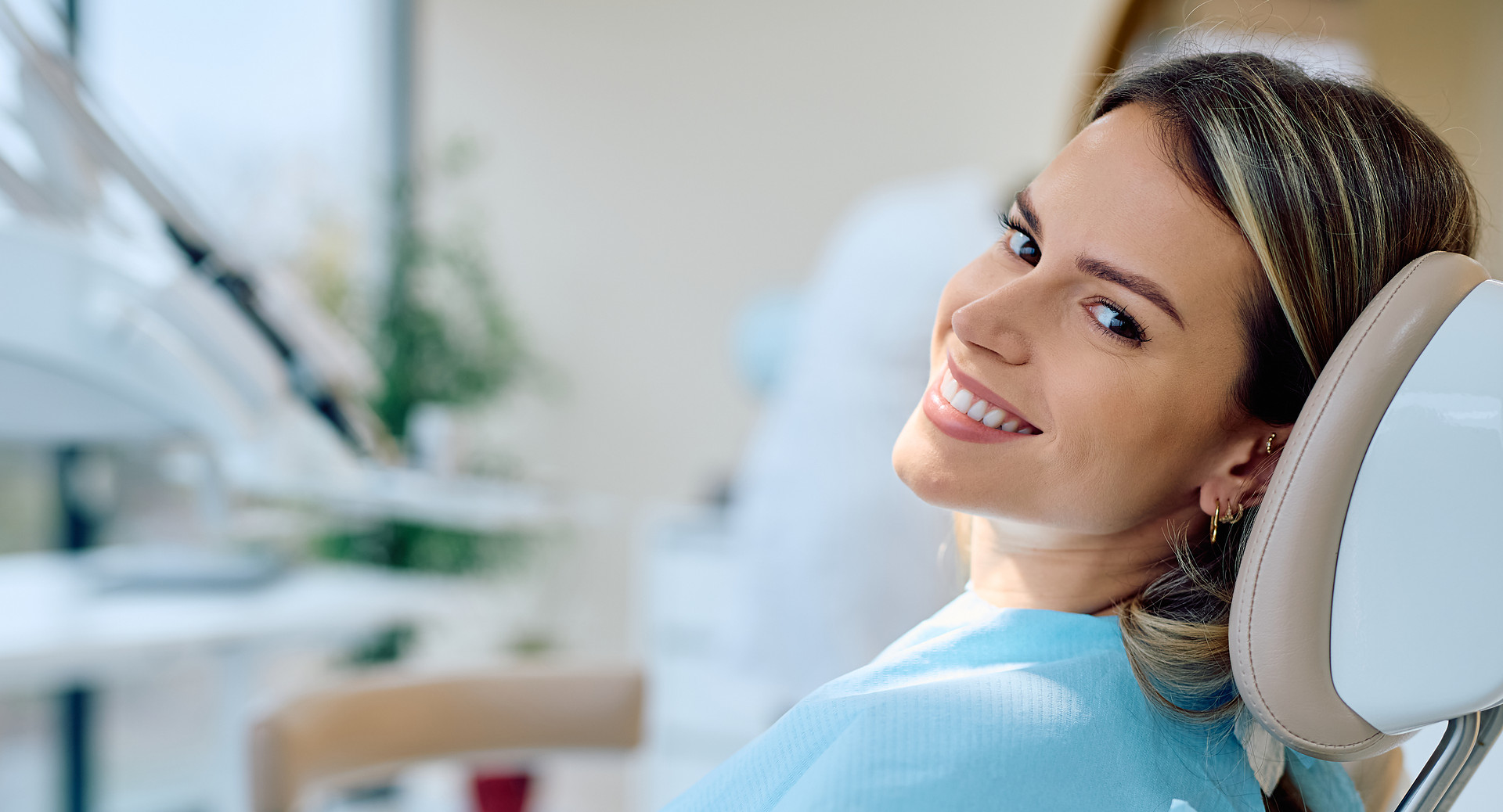 A smiling patient relaxing in the chair at Blanco Circle Dental Care in Salinas.