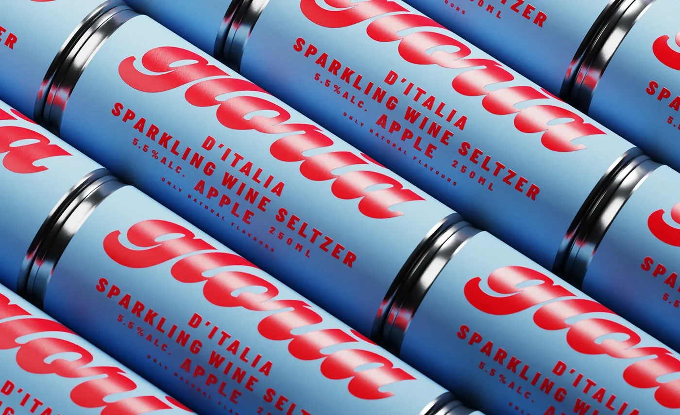 Gloria cans arranged on a pale blue surface