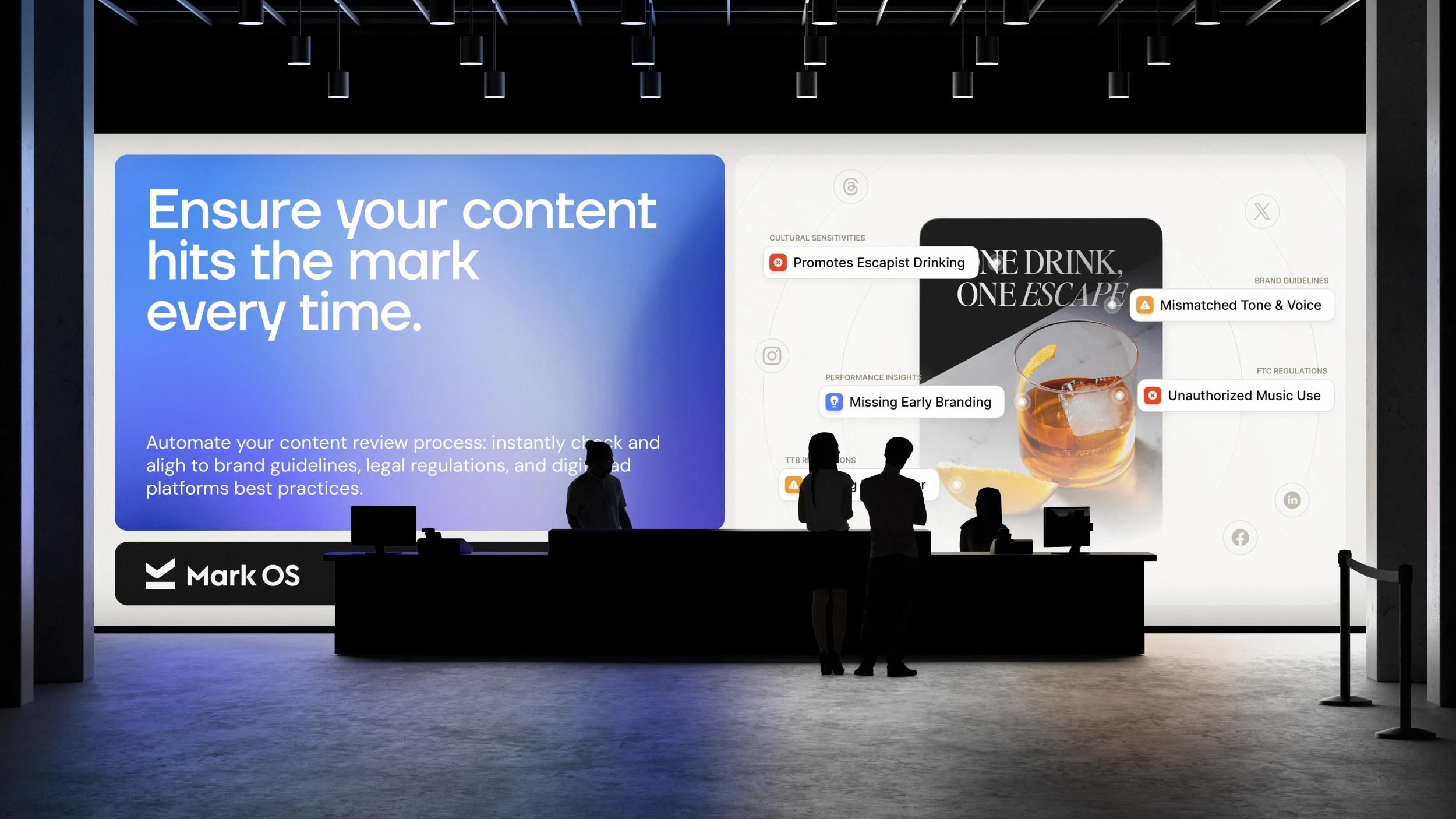 A wall-scale Mark OS installation in a lobby: the campaign headline beside a live product view flagging a drinks ad across cultural, brand, FTC and TTB checks