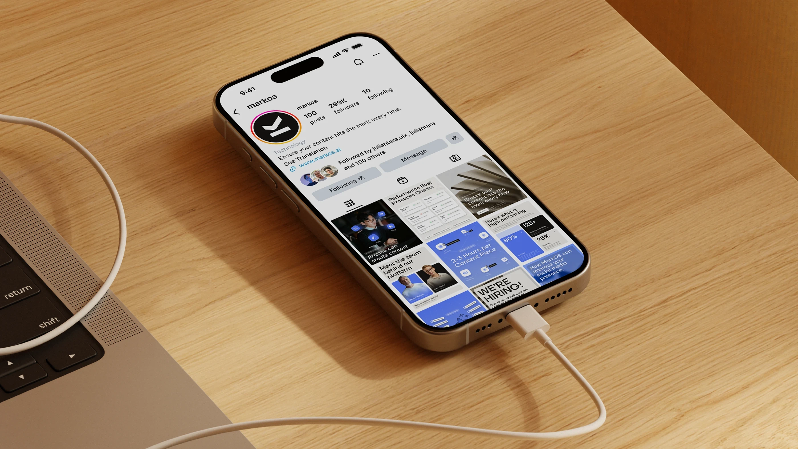 The Mark OS Instagram profile on a phone, its grid of launch posts visible