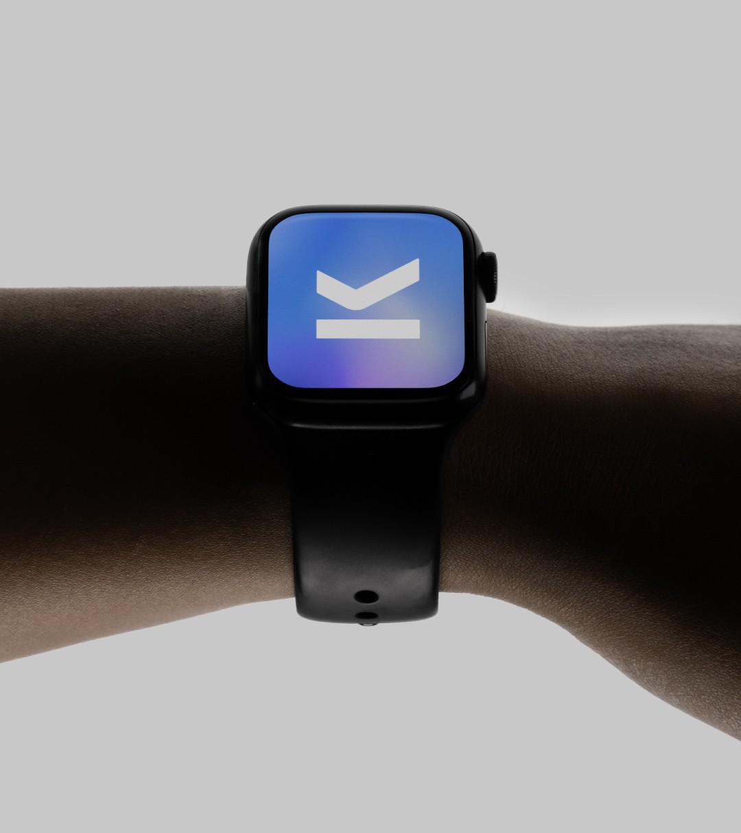The Mark OS logomark as a smartwatch face, white on the brand gradient