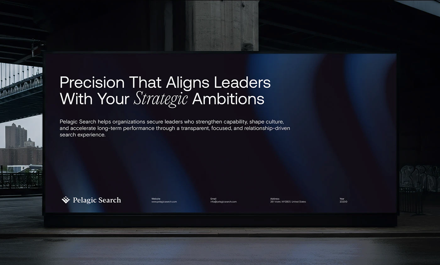 A Pelagic Search digital billboard beneath a bridge at dusk reading “Precision That Aligns Leaders With Your Strategic Ambitions”, over a soft navy and blue gradient