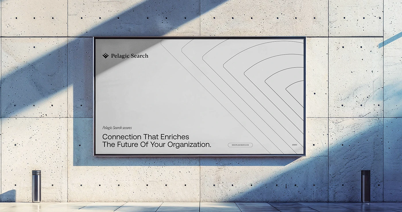 A Pelagic Search billboard on a sunlit concrete wall in mist gray, reading “Connection That Enriches The Future Of Your Organization”, with the chevron linework arcing across the right
