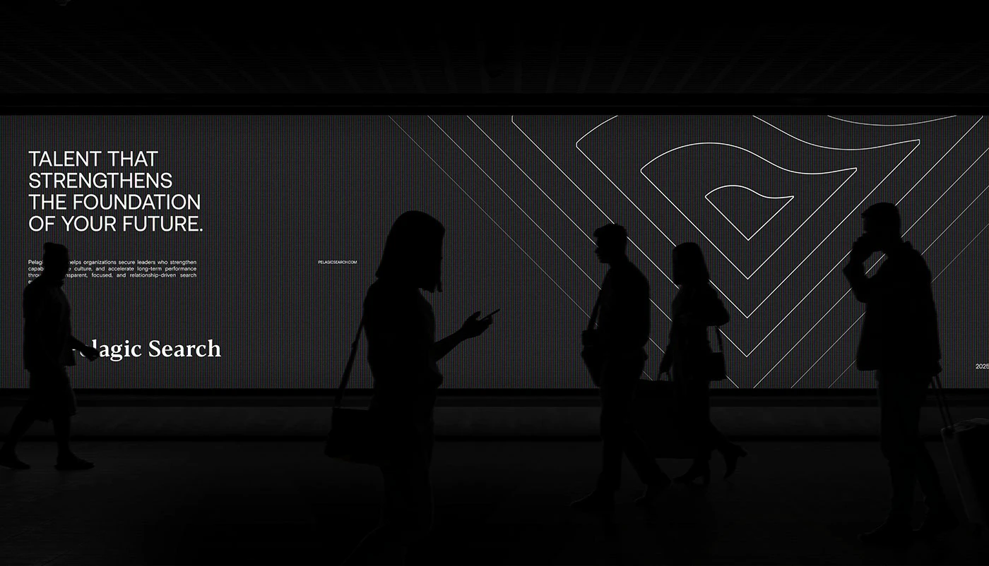 Commuters silhouetted against a wide LED wall reading “Talent That Strengthens The Foundation Of Your Future”, the symbol drawn in outline across the right of the screen