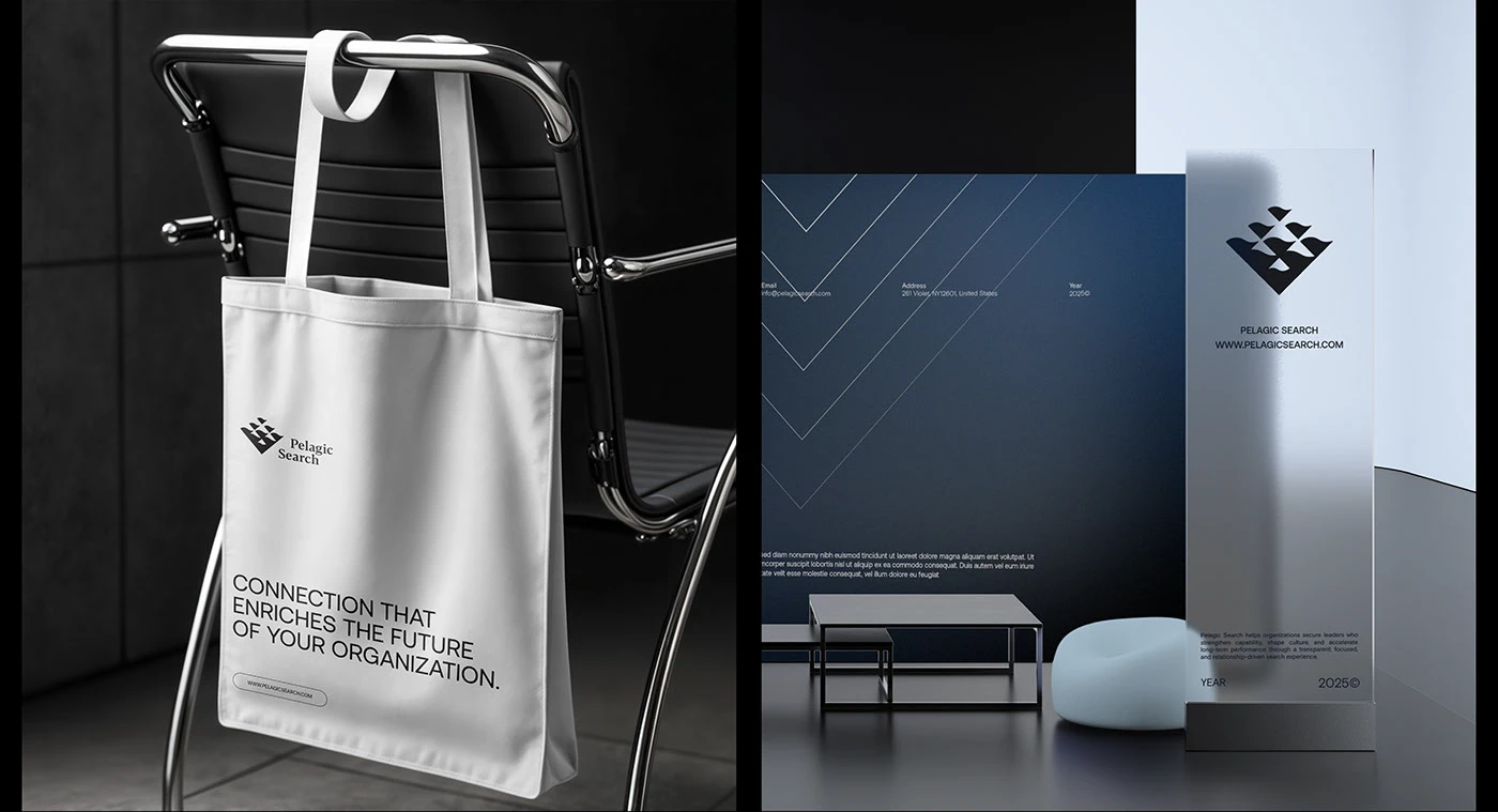 A white Pelagic Search tote printed “Connection that enriches the future of your organization” hanging from a chrome chair, beside a frosted acrylic standee carrying the symbol in a navy interior