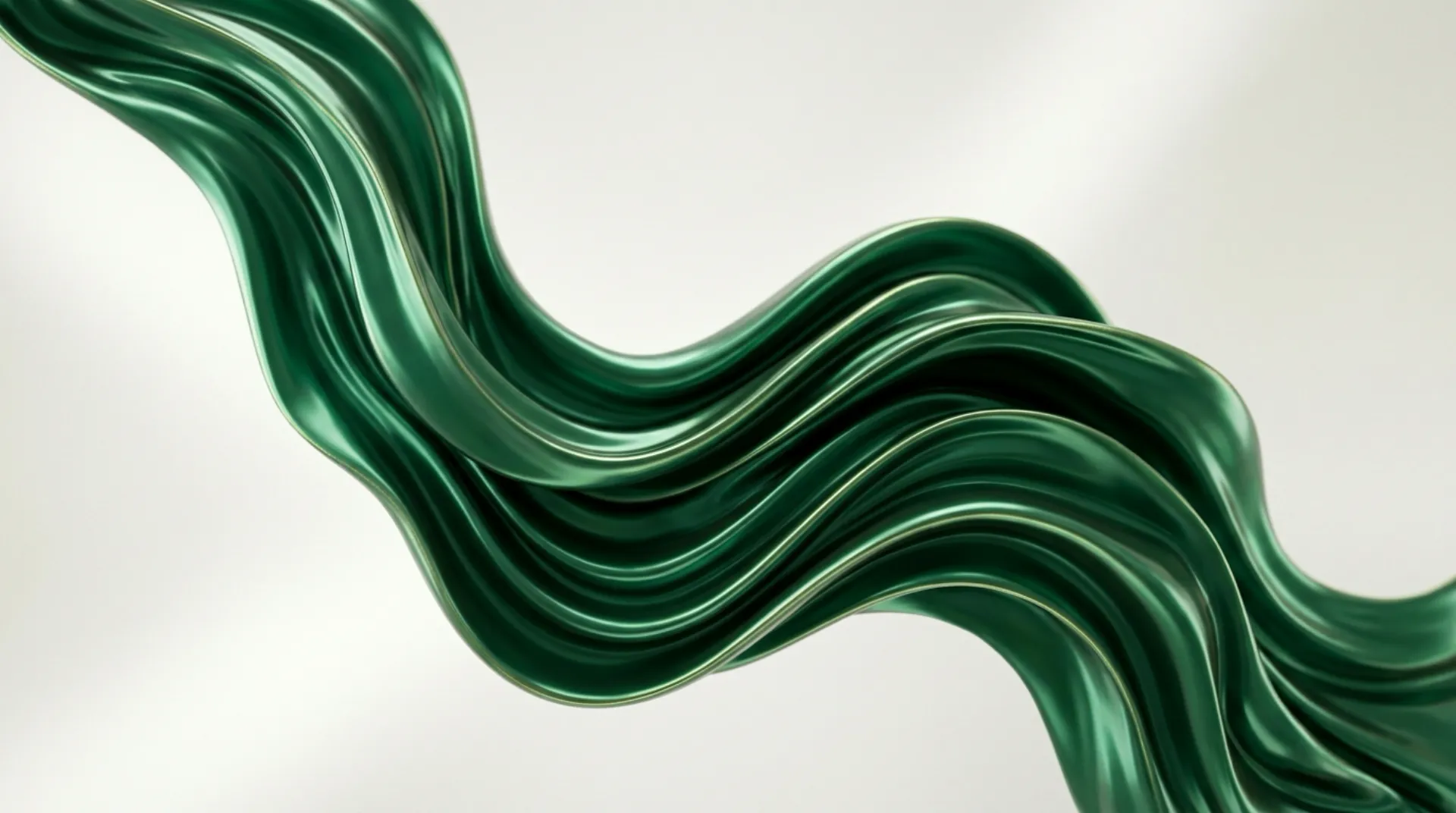 A folded ribbon of deep green glass curving across a pale background