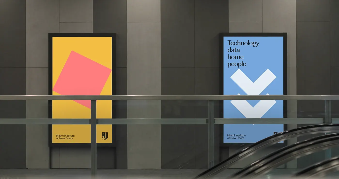 Backlit programme posters in a concrete transit concourse beside an escalator.