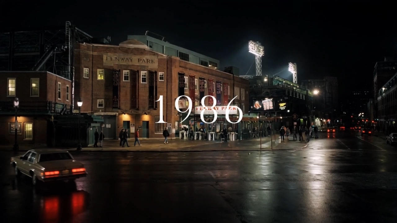 A ballpark facade at night, from The lookalike